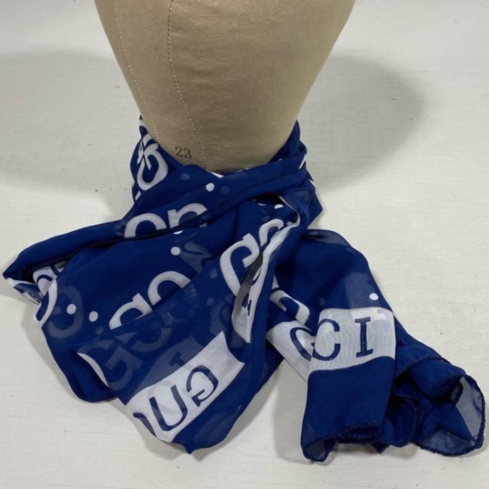 Blue and white sheer scarf with writing?